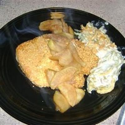 côtelettes de porc au poivre et au citron cuites au four et servies avec des pommes