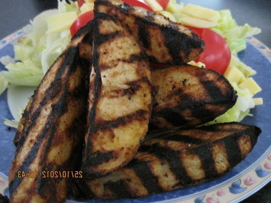 quartiers de pommes de terre grillées du neely