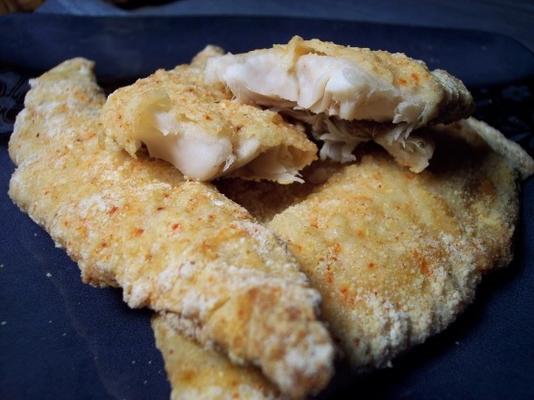 filets de poisson en croûte de parmesan et de semoule de maïs