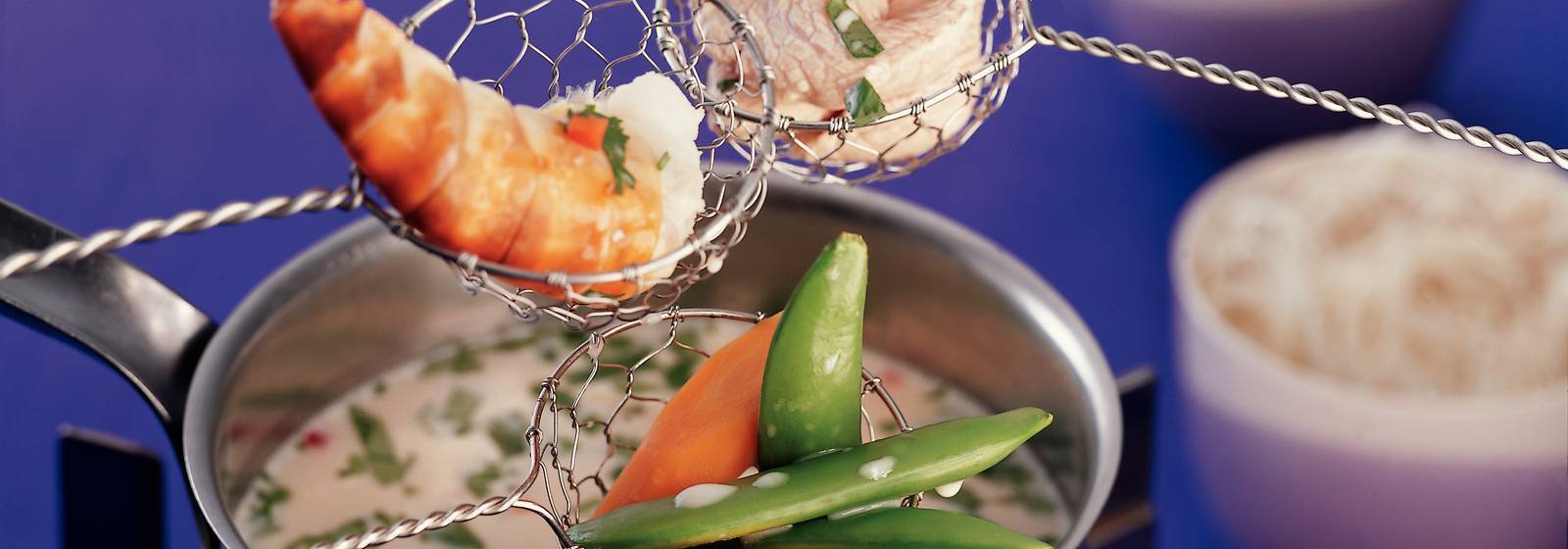 Bouillon thaï fondue au lait de coco - Guide Recettes